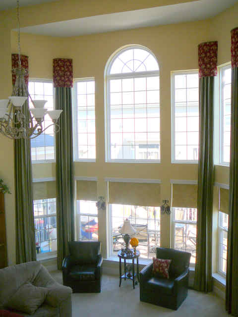 2-story-window-green-drapes-with-red-valance