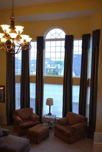 2-story-window-stripe-drapes-with-blue-valances