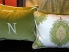 Velvet monogram pillows, with coordinating green fabric on back.