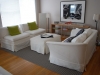 slipcovers-withskirt-on-armless-chairs-and-ottoman-and-loveseat
