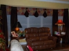 Cornice with velvet drapes and jabots, in bay window