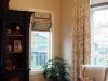 Euro Pleated Drapes on Custom Decorative Rod with large Band on lower hem and Matching Roman Shades