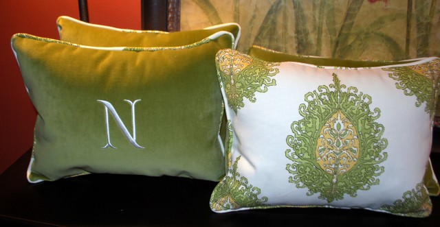 Green velvet pillows with monograming.