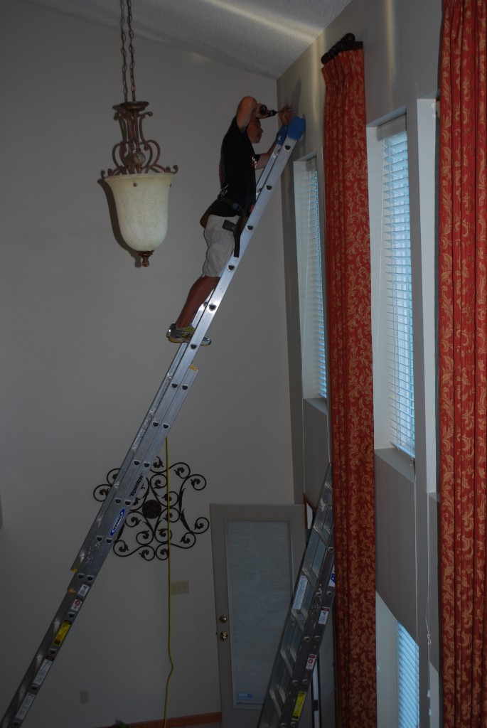 2 - Story Install of Drapery Panels on Rod and rings.