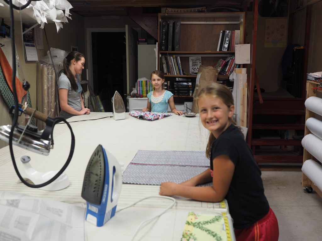 4-H girls working on skirts.