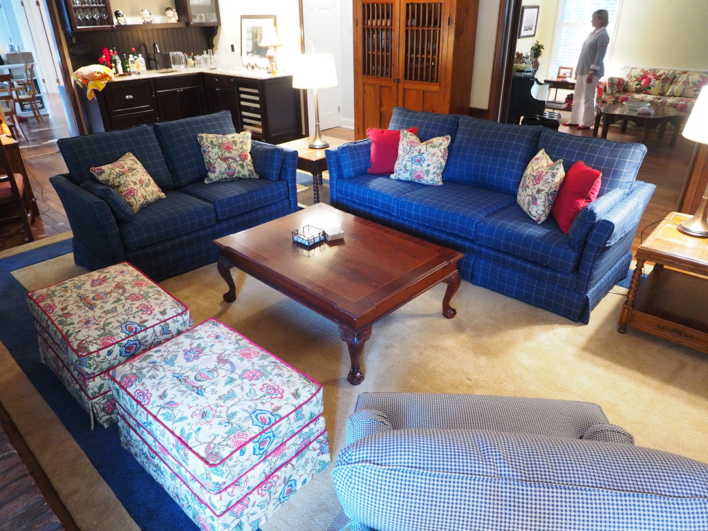 Family Room with new upholstery - Blue and White plaid sofa and loveseat, and Floral ottomans.